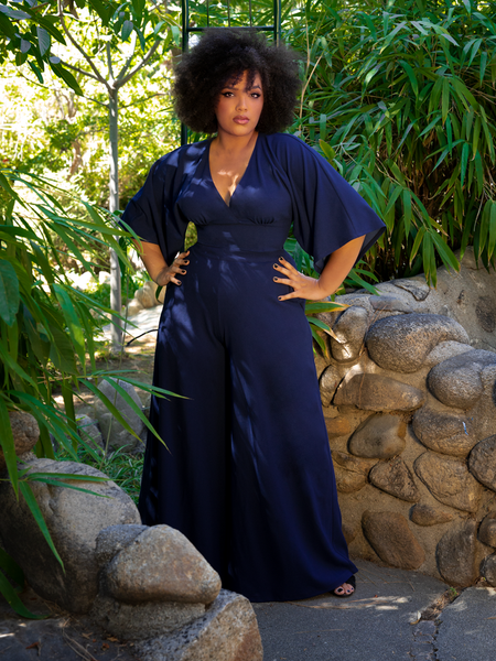 Ashleeta photographed in a glamourous gothic outfit including the Black Widow Palazzo Pants in Navy. 