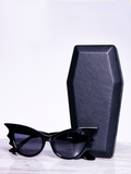 Isolated product shot of the Vamp Batwing Sunglasses in Black from gothic vintage clothing company La Femme en Noir.
