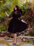 Looking dazzling in this gothic inspired dress, Rachel Sedory is caught mid-spin in the Mourning Dress in Black Lace from La Femme en Noir.